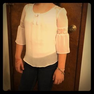 A dressy white floral shirt